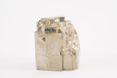 a rock that has a small piece of silver on it