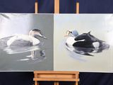 tableau représentant un canard et un caneton sur une toile posée sur un chevalet