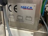 a machine that has a hose attached to the side of it