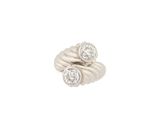a close up of a diamond ring on a white background