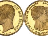 a gold sovereign coin with a profile of a woman ' s head