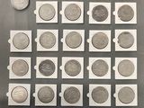a lot of coins that are sitting on a table