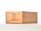 a wooden box that has a wine bottle in it