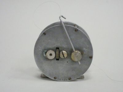 a small metal object with a wire attached to it