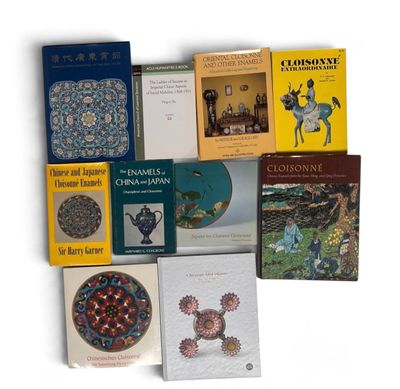 a lot of books that are sitting on a table