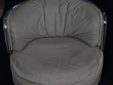 an image of a chair with a cushion on it