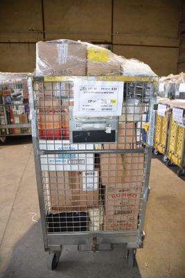 a metal cart with a lot of boxes on it