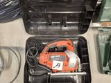 a black and decker tool box with tools in it