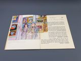 un livre ouvert sur lequel figure l'image d'une femme et d'un homme