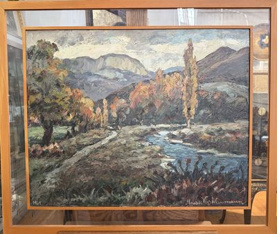 a picture of a painting on display in a glass case