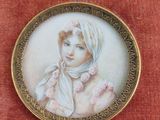 a picture of a picture of a young girl in a bonnet