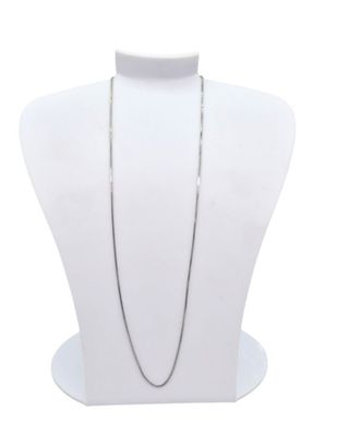a close up of a necklace on a mannequin with a white background