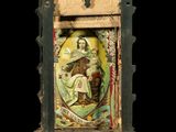 a clock with a picture of a woman on it