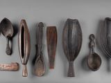many different types of spoons and spoon spoons on the wall