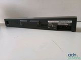an image of a black dvd player sitting on top of a white table