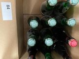 many bottles of wine sitting in a cardboard box