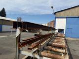 a lot of steel beams that are sitting on the ground