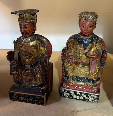 pair of antique chinese figurines of a man and a woman