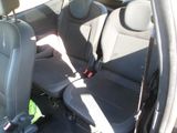 two seats in the back of a car that are empty