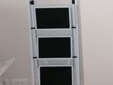 a white ladder in the corner of a room