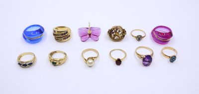 a group of rings and rings on a white surface