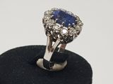 an image of a blue sapphire and diamond ring
