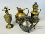 three different types of vases and a teapot on a table