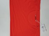 the shirt is red and has a white tag on it