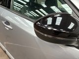 a close up of a car ' s side mirror on the side of the car