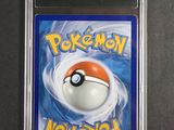 a close up of a pokemon card on a table