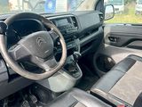 a dashboard of a car with a steering wheel in it