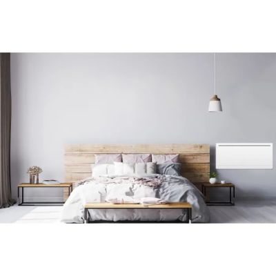 a bed with a wooden headboard and a night stand