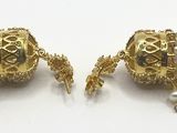 two pairs of gold and pearl earrings with pearls on them