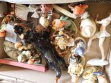 a box full of figurines and figurines in it