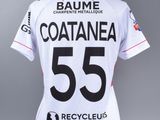 the back of a women ' s white jersey with a black and red number 55 on it