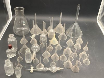 a lot of glass items that are sitting on a table