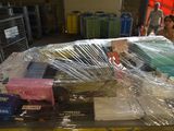 a lot of items that are wrapped up on a table