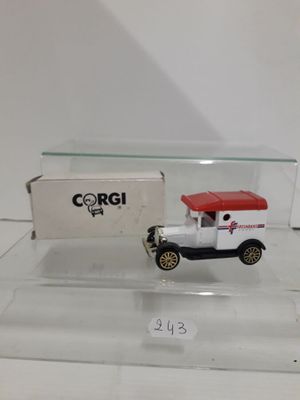 a small toy truck with a box on the back of it