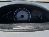 a close up of a car dashboard with a speedometer