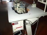 a sewing machine that is sitting on a table