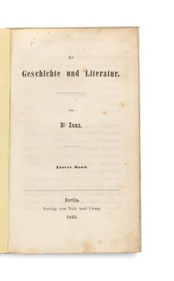 an old book with a black and white title on it