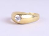 an image of a gold ring with a diamond on it