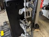 a picture of a machine that is sitting in a garage