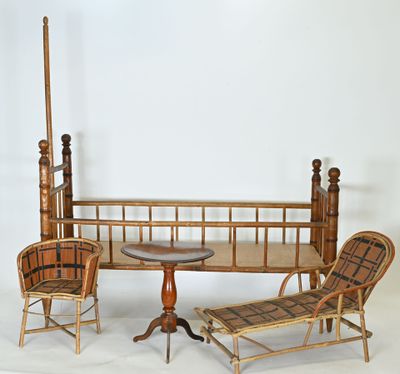 a wooden bed with a table and chairs in it