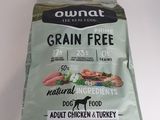 a bag of grain free dog food sitting on a white surface