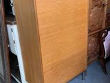 a refrigerator that is sitting in the middle of a room