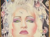 the front cover of a magazine with a picture of a woman with a crown on her head