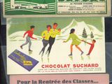 a poster for a chocolate shop in the window of a store