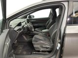 the interior of a car with the door open and the driver ' s seat down