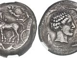 an ancient coin with a horse and rider on it